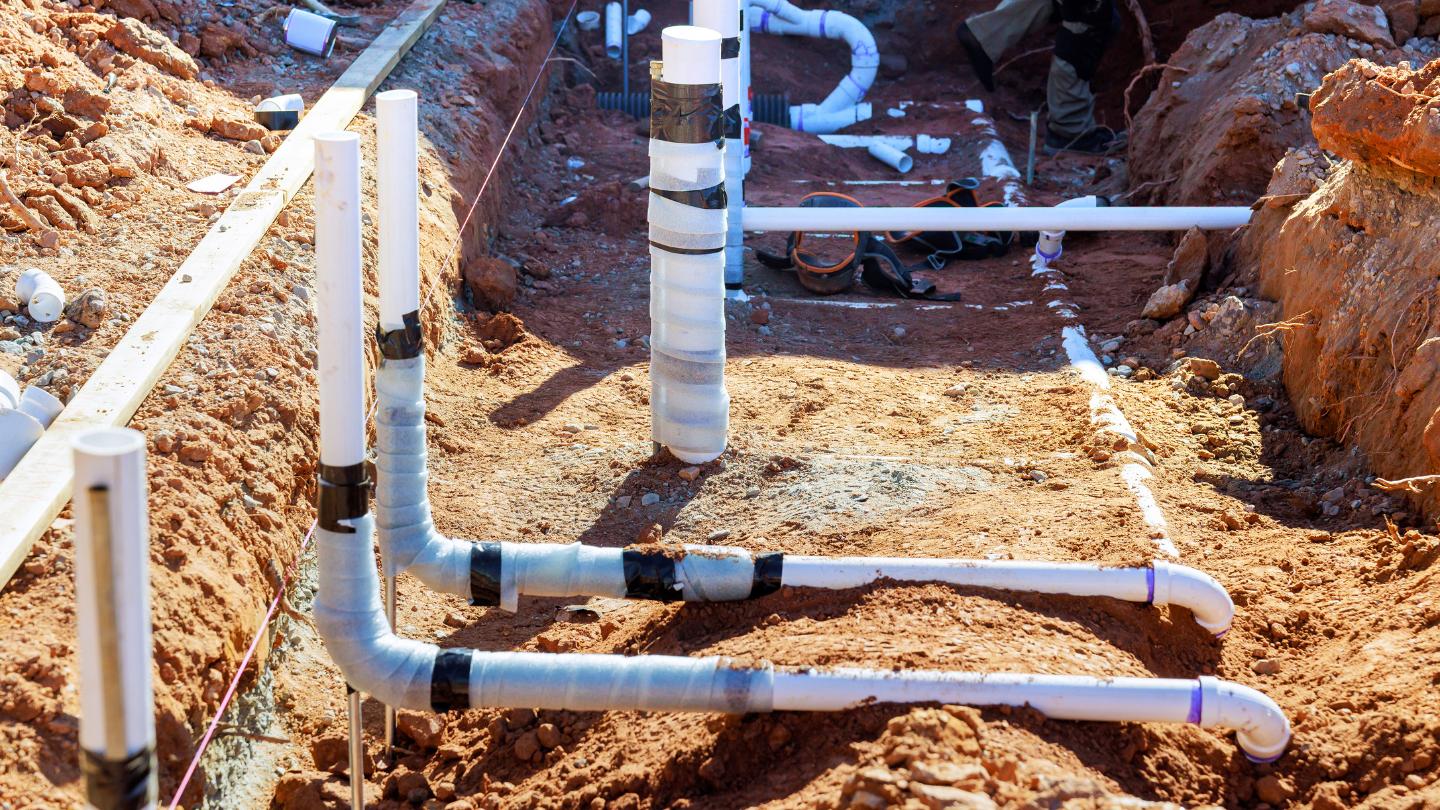 New white water supply lines laid in an open trench